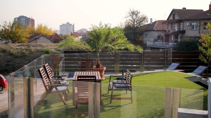 Stylish patio furniture on a rooftop terrace